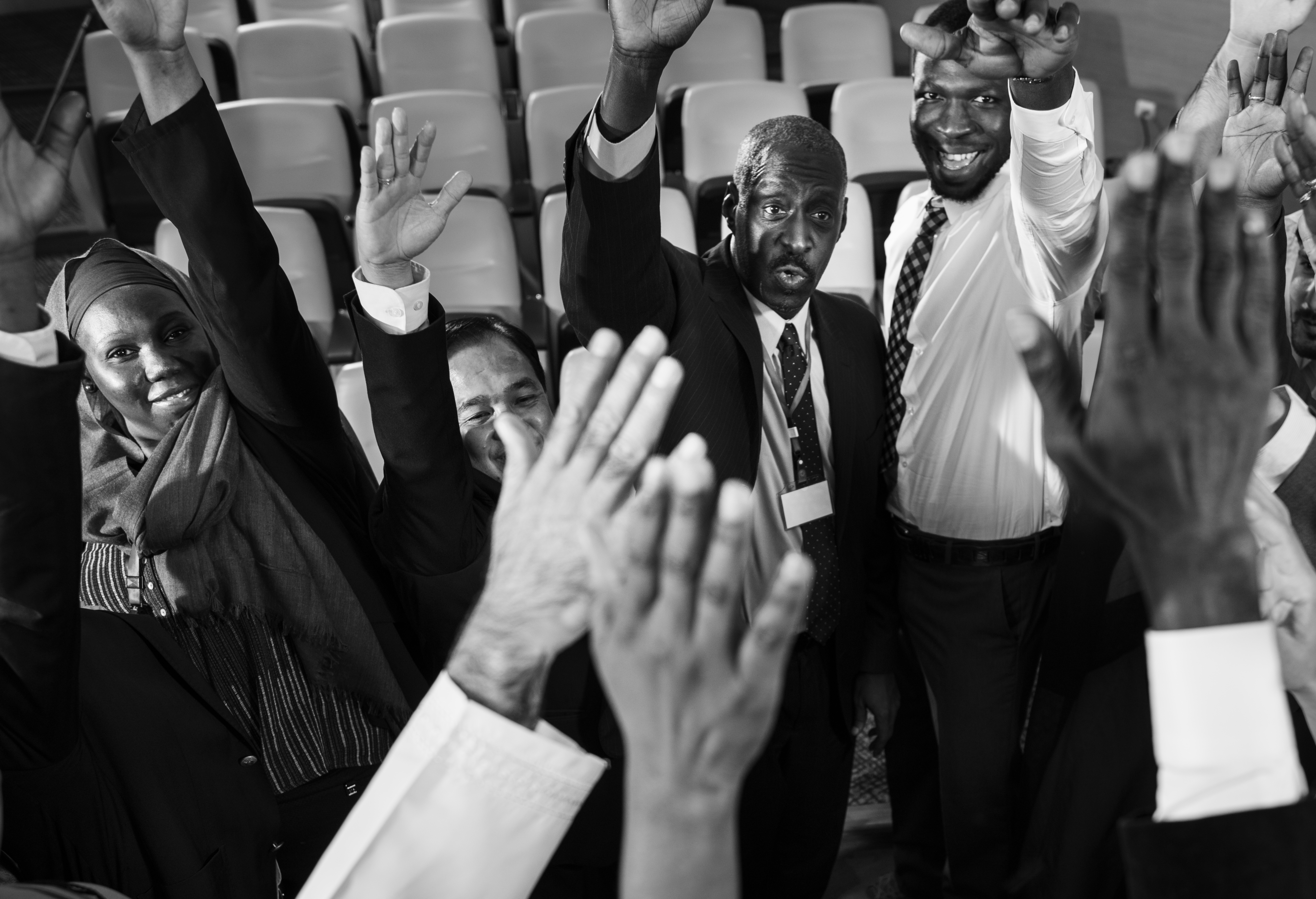 African health leaders and professionals standing confidently in a contemporary institutional building